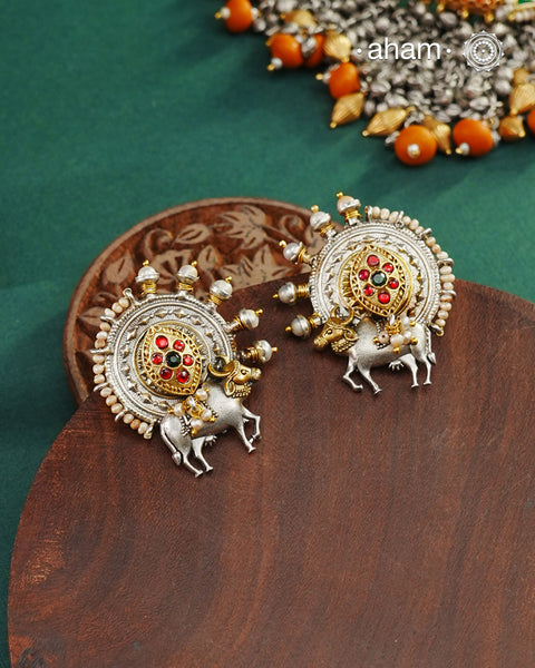 Noori two tone Earrings handcrafted in 92.5 sterling silver with kundan and gold highlights.Style this up with your favourite ethnic or fusion outfits to complete the look.