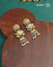 Noori two tone earrings handcrafted in 92.5 sterling silver with kundan and gold highlights.Style this up with your favourite ethnic or fusion outfits to complete the look.