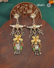 Noori two tone Earrings handcrafted in 92.5 sterling silver with kundan and gold highlights.Style this up with your favourite ethnic or fusion outfits to complete the look.