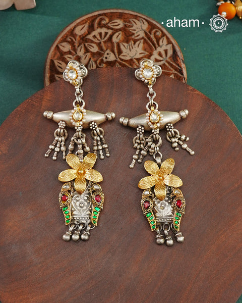 Noori two tone Earrings handcrafted in 92.5 sterling silver with kundan and gold highlights.Style this up with your favourite ethnic or fusion outfits to complete the look.