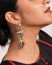 Noori two tone Earrings handcrafted in 92.5 sterling silver with kundan and gold highlights.Style this up with your favourite ethnic or fusion outfits to complete the look.