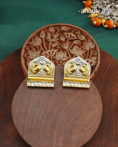 Noori two tone Earrings handcrafted in 92.5 sterling silver with kundan and gold highlights.Style this up with your favourite ethnic or fusion outfits to complete the look.