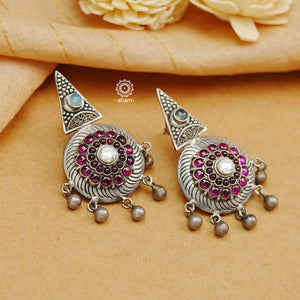 Handcrafted 92.5 sterling Silver earring from our Malhar collection. Hand silver work, with kemp stone highlights. 