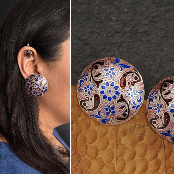 Elevate your style with our Meena Work Silver Earrings. Handcrafted in 92.5 silver, these earrings feature traditional meenawork, adding intricate detail to your ensemble. Enhance your look with this elegant and timeless accessory.