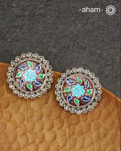 Elevate your style with our Meena Work Silver Earrings. Handcrafted in 92.5 silver, these earrings feature traditional meenawork, adding intricate detail to your ensemble. Enhance your look with this elegant and timeless accessory.