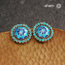 Elevate your style with our Meena Work Silver Earrings. Handcrafted in 92.5 silver, these earrings feature traditional meenawork, adding intricate detail to your ensemble. Enhance your look with this elegant and timeless accessory