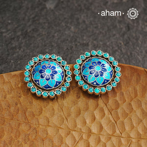 Elevate your style with our Meena Work Silver Earrings. Handcrafted in 92.5 silver, these earrings feature traditional meenawork, adding intricate detail to your ensemble. Enhance your look with this elegant and timeless accessory