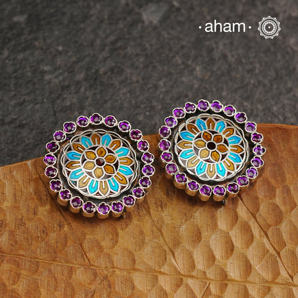 This Meena Work Festive Silver Studs is a stunning piece of jewellery perfect for special occasions. It features a combination of kundan and meena work all crafted in 92.5 silver.