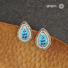 Elevate your style with our Meena Work Silver Earrings. Handcrafted in 92.5 silver, these earrings feature traditional meenawork, adding intricate detail to your ensemble. Enhance your look with this elegant and timeless accessory.