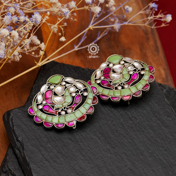 Beautiful Ira Peacock earrings with pink and green semiprecious stones. Handcrafted in 92.5 sterling silver. Can be paired with both ethnic and western outfits. 