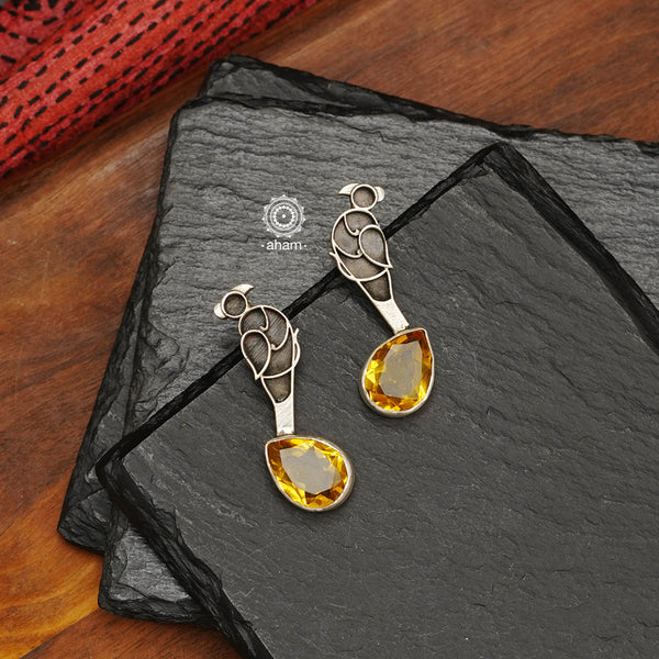 Beautiful Ira bird motif earrings. Handcrafted in 92.5 sterling silver with a beautiful colour stone drop. Works great with smart casuals and workwear. 