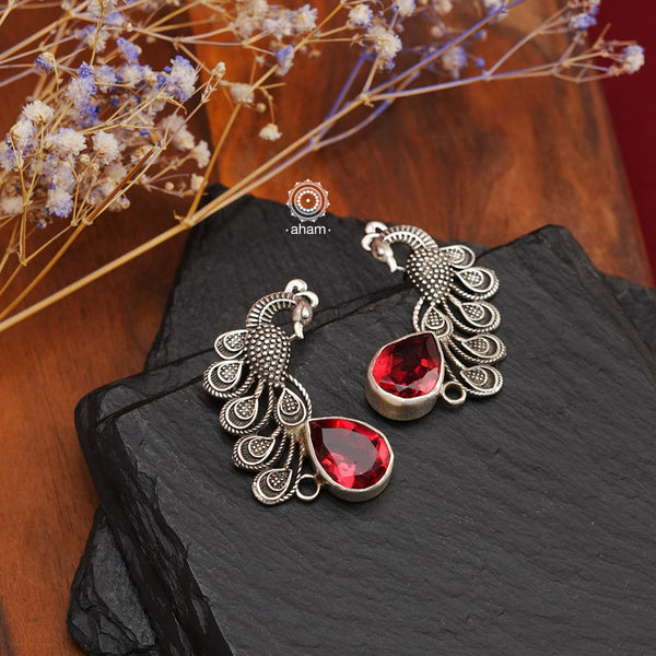 Handcrafted 92.5 sterling silver Ira earrings. Intricate peacock motif with a beautiful red drop. Perfect as casual and work wear. 