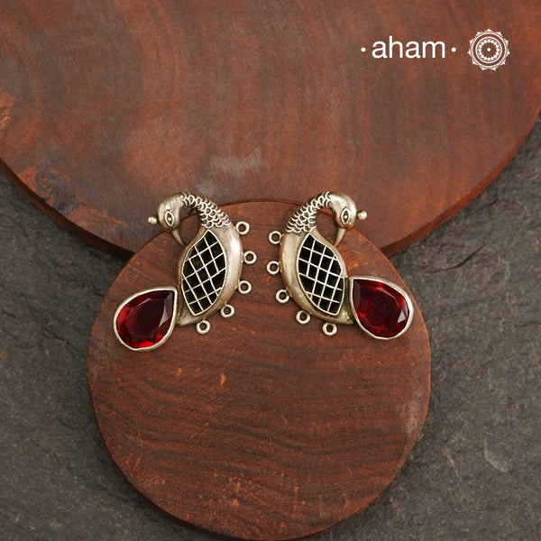 Handcrafted 92.5 sterling silver Ira earrings. Intricate peacock motif with a beautiful red drop. Perfect as casual and work wear.
