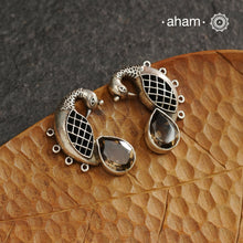 Handcrafted 92.5 sterling silver Ira earrings. Intricate peacock motif with a beautiful red brown stone drop. Perfect as casual and work wear.