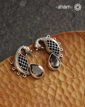 Handcrafted 92.5 sterling silver Ira earrings. Intricate peacock motif with a beautiful red brown stone drop. Perfect as casual and work wear.