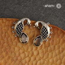 Handcrafted 92.5 sterling silver Ira earrings. Intricate peacock motif with a beautiful red brown stone drop. Perfect as casual and work wear.