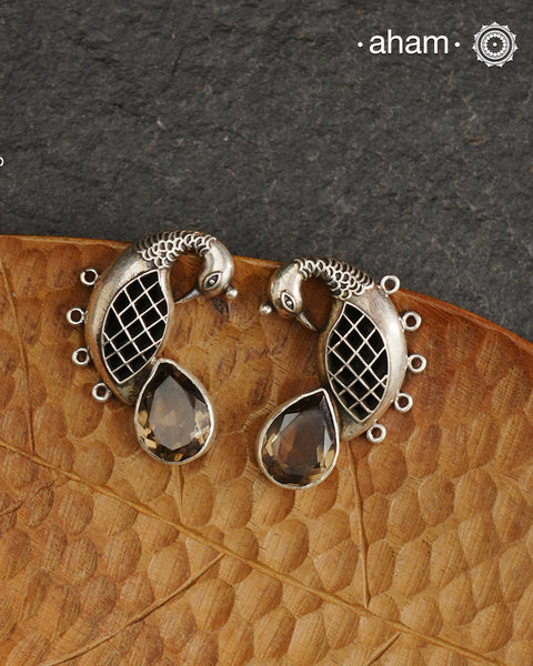 Handcrafted 92.5 sterling silver Ira earrings. Intricate peacock motif with a beautiful red brown stone drop. Perfect as casual and work wear.