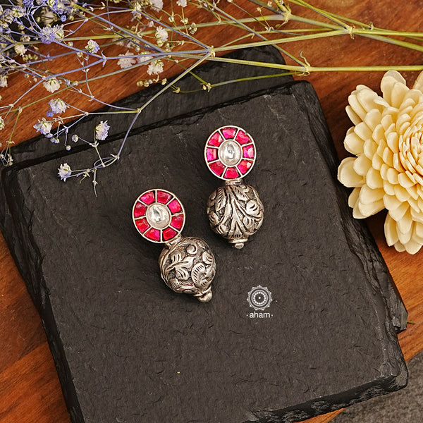 Our Ira Drop Silver Earrings are an excellent way to dress up your work wardrobe with class and sophistication. Crafted from 92.5 sterling silver, these earrings feature a chitai work drop and a pink kundan top for a timeless, elegant look that can easily transition from the office to after-work drinks.