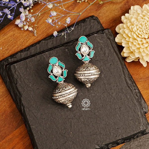 Made from 92.5 sterling silver, these Ira drop earrings are light, elegant, and sure to make a statement. The stunning turquoise stones make these earrings one of our favorites from the collection.