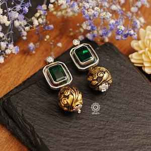 Ira drop earrings with elegant Green stone. Handcrafted in 92.5 sterling silver with semi precious stone setting. Can be paired with both ethnic and western outfits. 