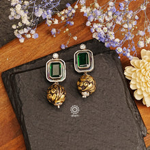 Ira drop earrings with elegant Green stone. Handcrafted in 92.5 sterling silver with semi precious stone setting. Can be paired with both ethnic and western outfits. 