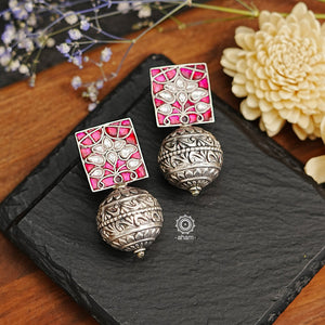 The Ira Pink Kundan Drop Silver Earrings are the perfect accent for your wardrobe. Crafted from 92.5 sterling silver, these earrings feature beautiful details and are lightweight for all-day comfort. Add a touch of elegance with this timeless jewellery.