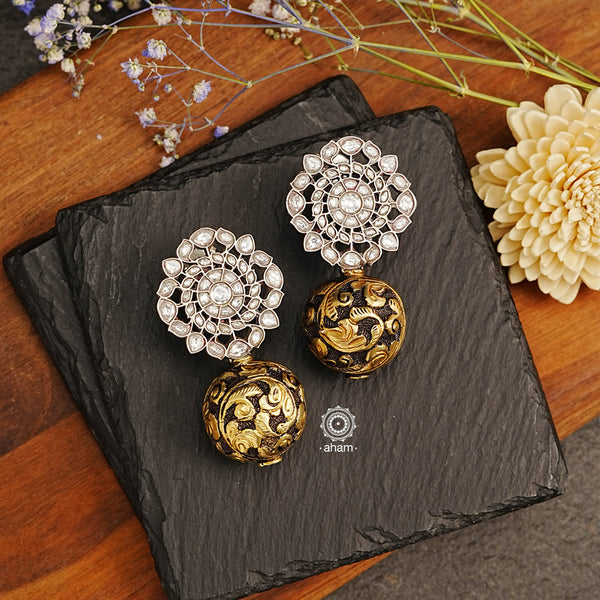 These Ira Kundan Drop Silver Earrings are sure to turn heads. Dual tone, with a Kundan top and dull gold chitai drop, they're a statement piece crafted with 92.5 sterling silver. Show off your style.