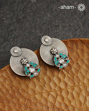 Smart earrings crafted in 92.5 silver with turquoise highlights.