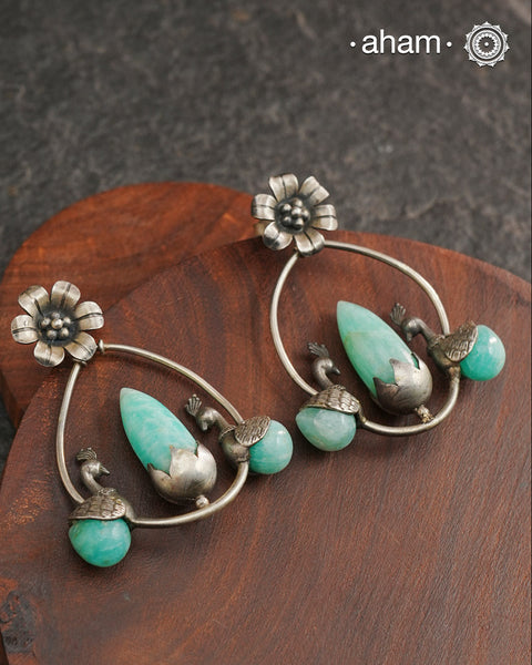 Handcrafted 92.5 sterling silver Ira Earrings with sea green stone setting. Perfect for special occasions and festivities.