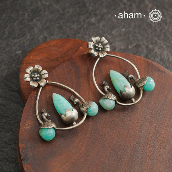 Handcrafted 92.5 sterling silver Ira Earrings with sea green stone setting. Perfect for special occasions and festivities.