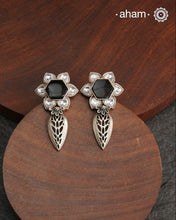 Handcrafted 92.5 sterling silver Ira Earrings with kundan and black stone highlight.Perfect for special occasions and festivities.