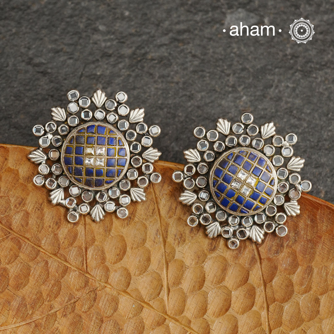 Handcrafted 92.5 sterling silver Ira Earrings with lapis chips in the center surrounded by zircon stones. Perfect for special occasions and festivities.