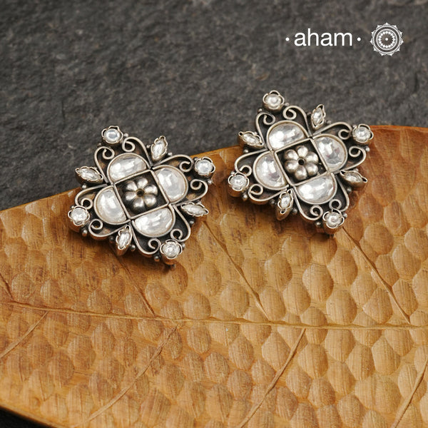 Handcrafted with precision, the Ira Silver Studs are adorned with stunning kundan work. Made from 92.5 silver, these elegant earrings add a touch of sophistication to any outfit. Perfect for special occasions.