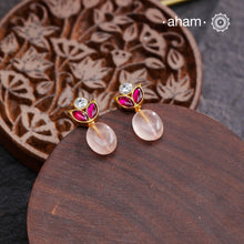 Elevate your style with our Rose Quartz Kundan Gold Polish Silver Earrings. Beautifully crafted with a rose quartz bead adorned with white and pink Kundan gold polish, these earrings are a statement of elegance. Enhance your look with the healing properties of rose quartz, known to promote love and positivity.