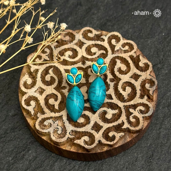 Turquoise drop earrings set in 92.5 silver. These make for great gifts.