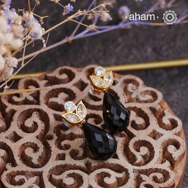 Black Onyx Briolette Drop earrings with kundan set in Silver and dipped in Gold Polish.
Your perfect work to party wear earrings.