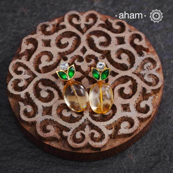 Citrine Bead With Green White Kundan Gold Polish Silver Earrings crafted in 92.5 silver with gold polish. Perfect for work wear and they also make great gifts