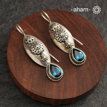 Handcrafted 92.5 sterling silver Ira drop earrings with blue galss drop. Perfect for special occasions and festivities.