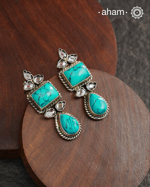 The Ira Silver Earrings are the perfect accent for your wardrobe. Crafted from 92.5 sterling silver, these earrings feature beautiful turquoise stone details. Add a touch of elegance with this timeless jewellery.