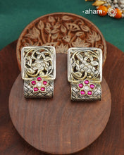 These Ira Silver Earrings add a touch of glamour to any outfit. With a stunning kundan flower highlight, these earrings are crafted in 92.5 silver for a luxurious touch. Elevate your style and make a statement with these elegant and timeless earrings.