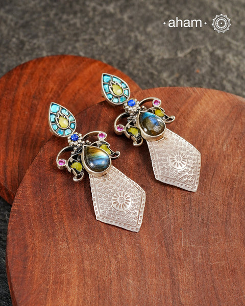 The Ira Silver Earrings are the perfect accent for your wardrobe. Crafted from 92.5 sterling silver, these earrings feature beautiful details and vibrant stone setting.Add a touch of elegance with this timeless jewellery.