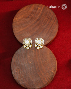 These expertly crafted studs feature 92.5% sterling silver with a fine gold polish finish and elegantly set with brilliant moissanite stones. Designed to offer lasting shine and sophistication making them a perfect choice for both everyday wear and special occasions.
