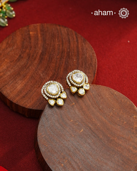 These expertly crafted studs feature 92.5% sterling silver with a fine gold polish finish and elegantly set with brilliant moissanite stones. Designed to offer lasting shine and sophistication making them a perfect choice for both everyday wear and special occasions.
