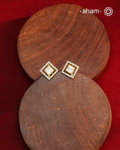 These expertly crafted studs feature 92.5% sterling silver with a refined gold polish finish, elegantly set with brilliant moissanite stones. Designed to offer lasting shine and sophistication making them a perfect choice for both everyday wear and special occasions.