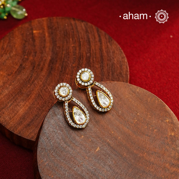 Expertly crafted earrings feature 92.5% sterling silver with a refined gold polish finish and elegantly set with brilliant moissanite stones. Designed to offer lasting shine and sophistication making them a perfect choice for both everyday wear and special occasions.