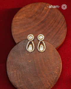 Expertly crafted earrings feature 92.5% sterling silver with a refined gold polish finish and elegantly set with brilliant moissanite stones. Designed to offer lasting shine and sophistication making them a perfect choice for both everyday wear and special occasions.