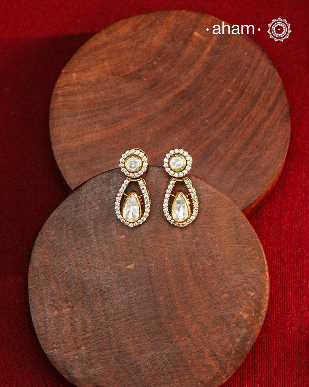 Expertly crafted earrings feature 92.5% sterling silver with a refined gold polish finish and elegantly set with brilliant moissanite stones. Designed to offer lasting shine and sophistication making them a perfect choice for both everyday wear and special occasions.