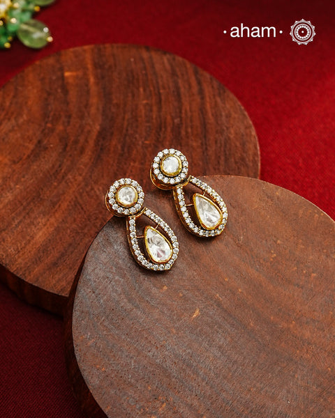 Expertly crafted earrings feature 92.5% sterling silver with a refined gold polish finish and elegantly set with brilliant moissanite stones. Designed to offer lasting shine and sophistication making them a perfect choice for both everyday wear and special occasions.