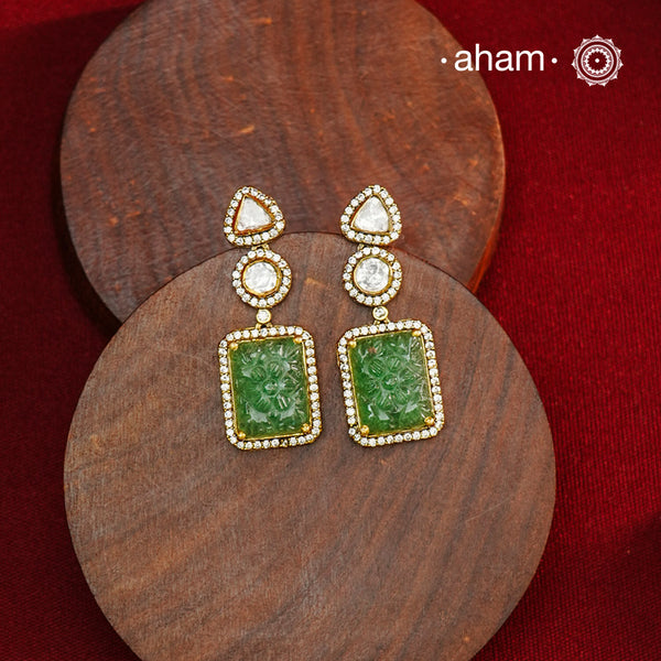 Expertly crafted earrings in 92.5% sterling silver with a refined gold polish finish, elegantly set with brilliant moissanite stones and green drop. Designed to offer lasting shine and sophistication making them a perfect choice for special occasions.