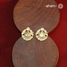 These expertly crafted studs feature 92.5% sterling silver with a refined gold polish finish, elegantly set with brilliant moissanite stones. Designed to offer lasting shine and sophistication making them a perfect choice for both everyday wear and special occasions. 